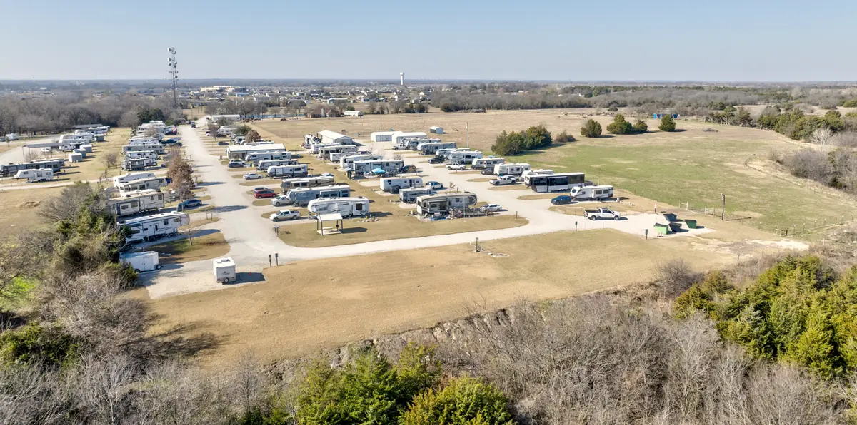 Aerial view of Countryview Resort's RV sites and pasture